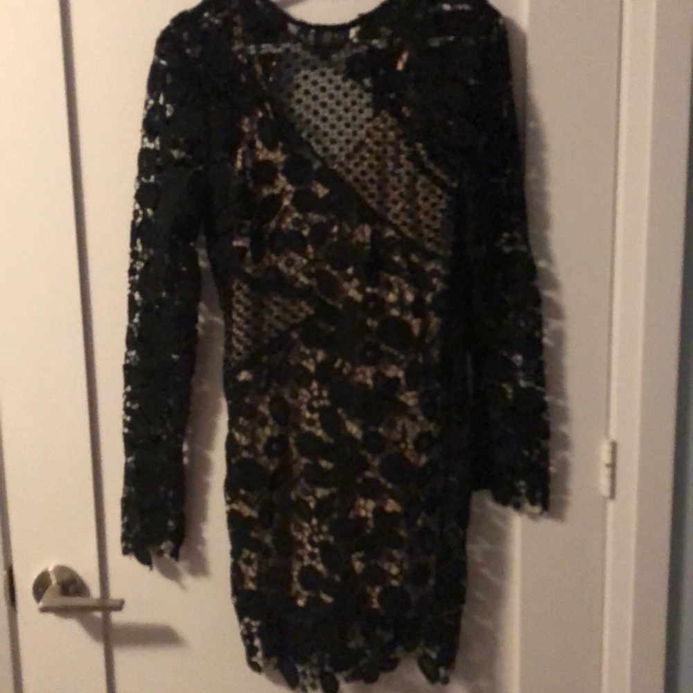 Black mesh with skin tone under dress